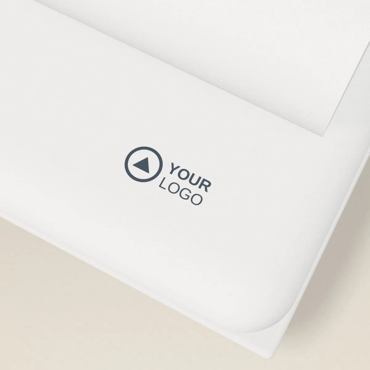 Close-up of the logo branding on the Cotton Muslin Baby Swaddle Blanket
